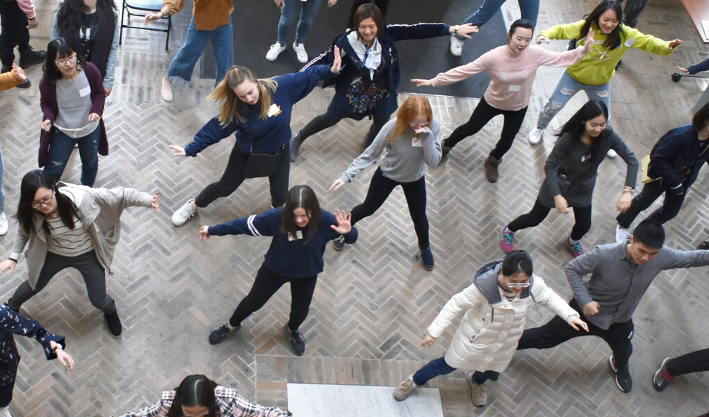 Photo of students doing an exercise at the BISP Cultural Peer Mentors mixer at UC Berkeley