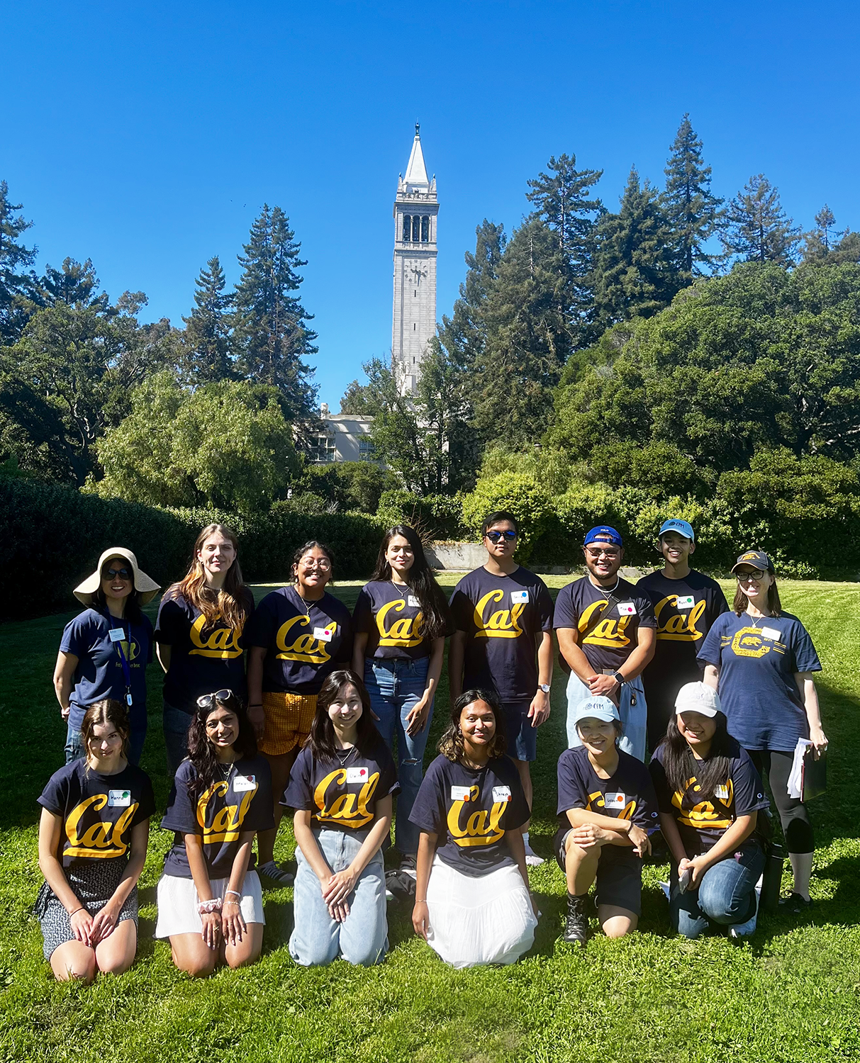 image of CPMs wearing Cal shirts and the Campanile background